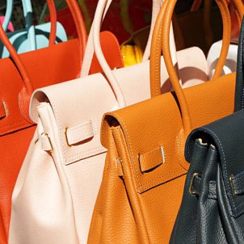 vivid fine  leather handbags collection on San Lorenzo market in  Florence, Italy, Europe
